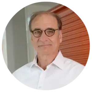 Mark Helm in front of self-storage units